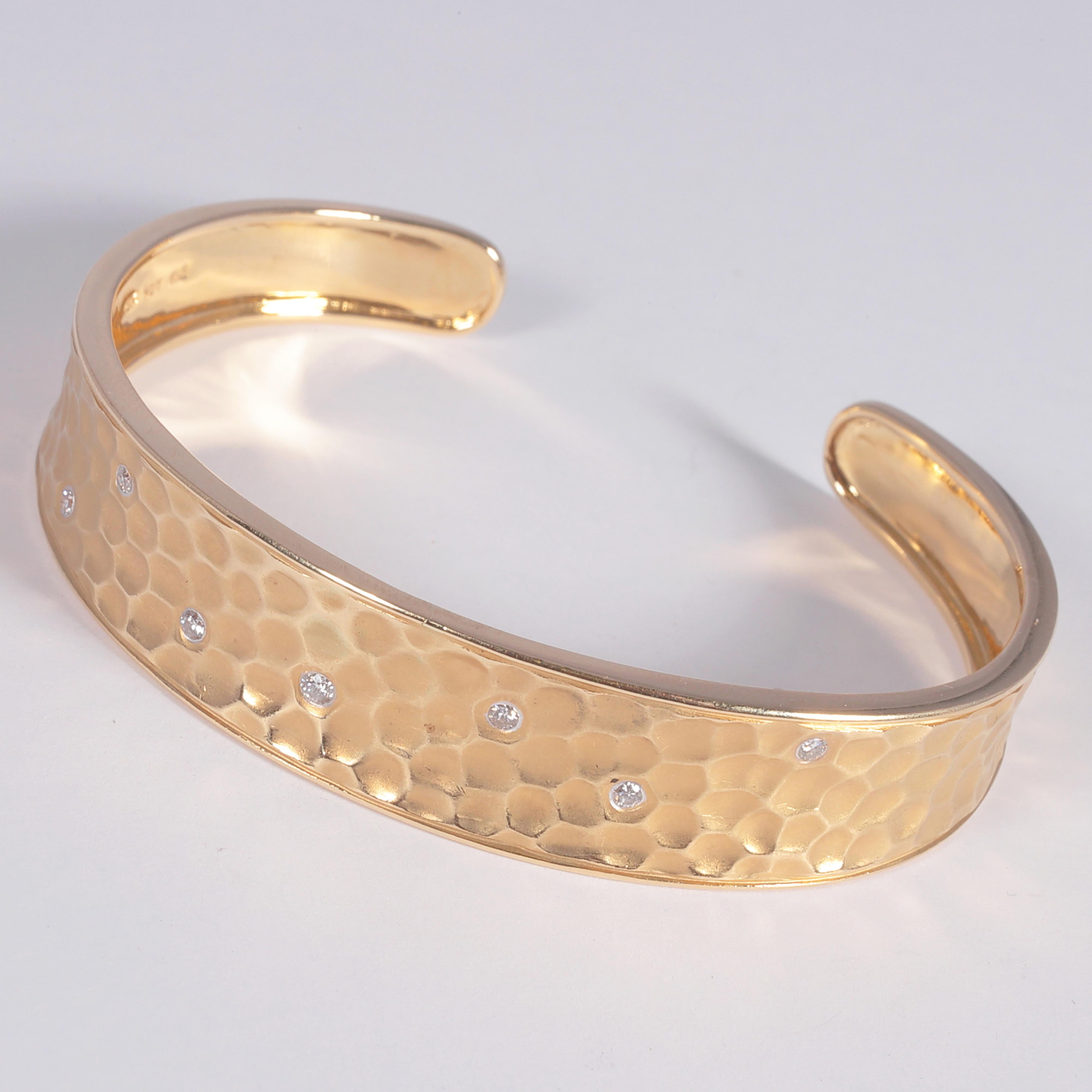 Purchased from Maison Maurice out of a Florida estate, this cuff bracelet could be worn every single day!  It is that comfortable! Featuring 0.15 carats of bright diamonds and tapering in width from 0.11 mm down to 5.00 mm, it measures approximately