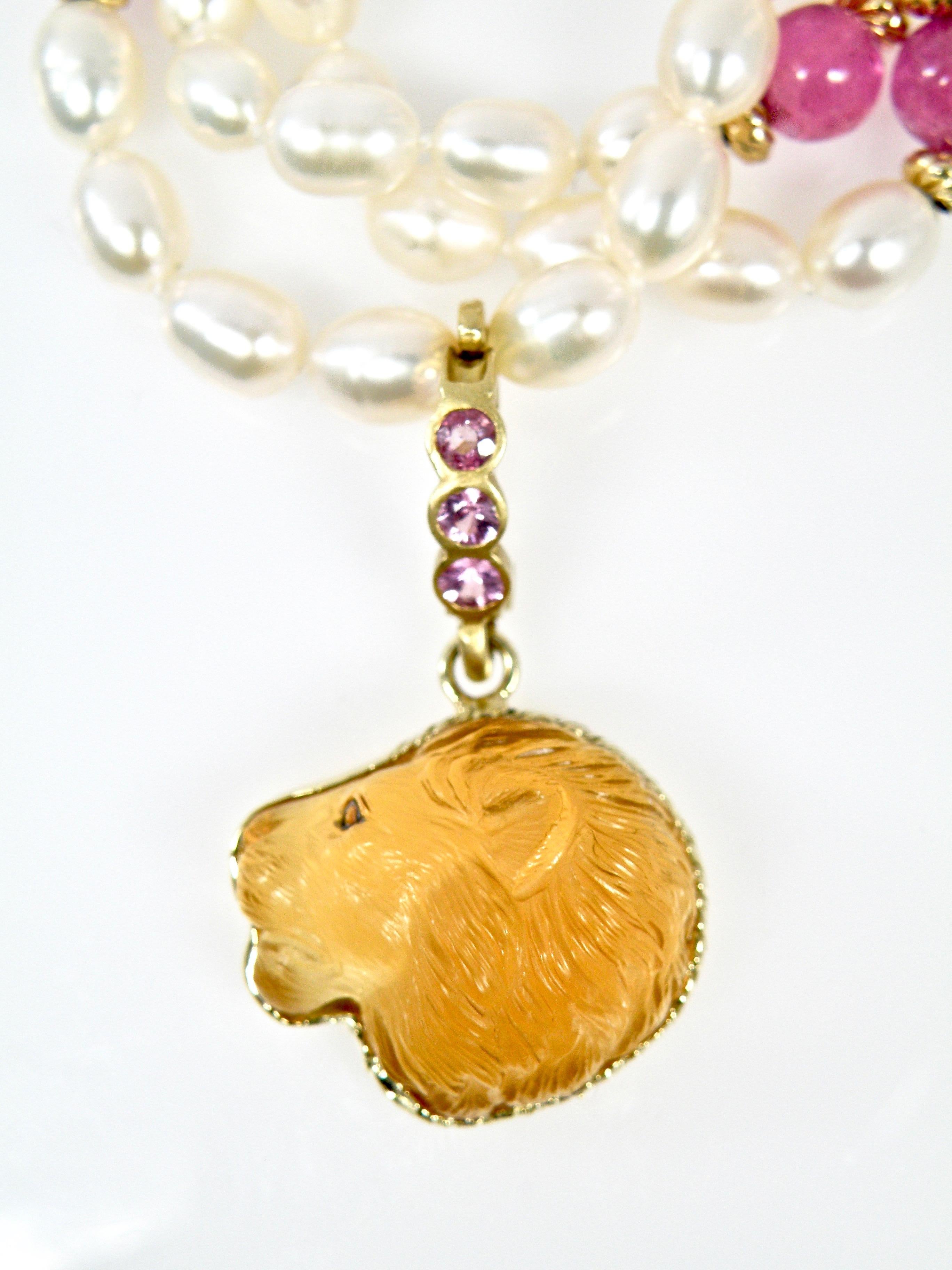 Modern 18 Karat Hand Carved Citrine Lionshead with Sapphire Bail For Sale