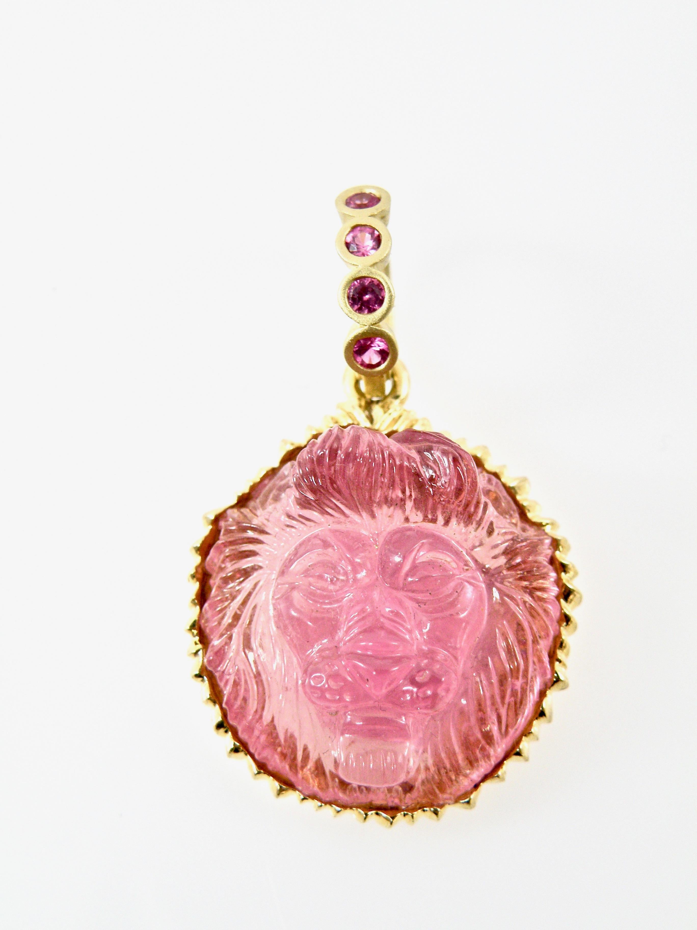 Modern 18 Karat Hand Carved Pink Tourmaline Lionshead with Pink Sapphire Bail For Sale