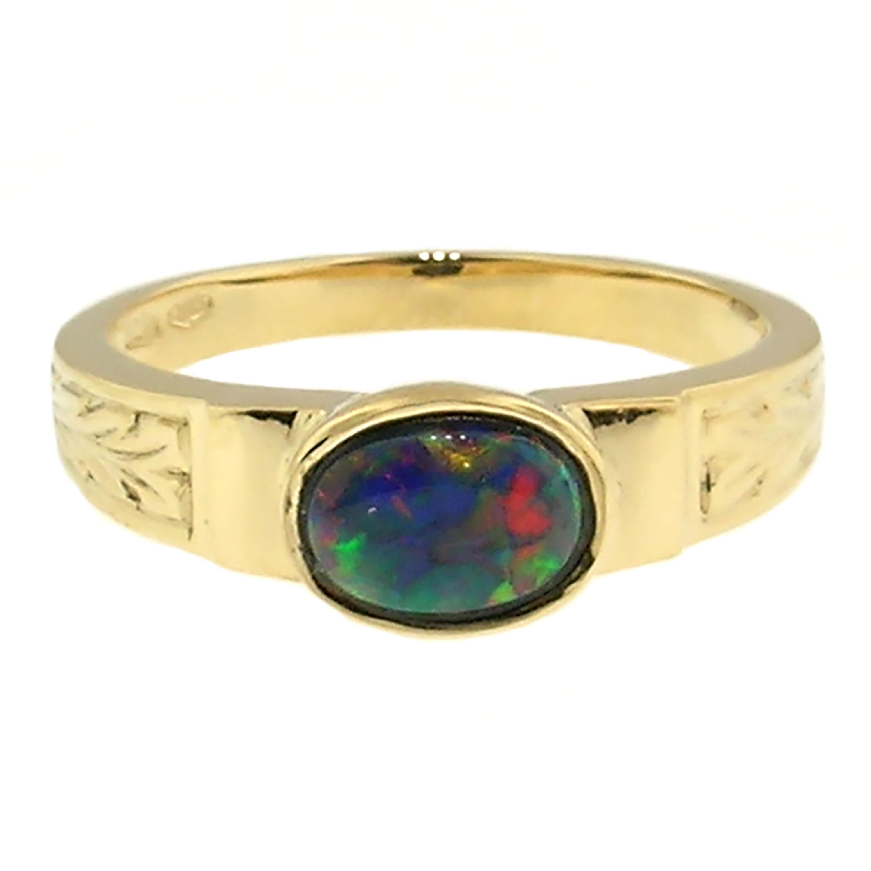 Oval Cut 18 Karat Hand Engraved Ring with Lightening Ridge Black Opal, Handmade in Italy