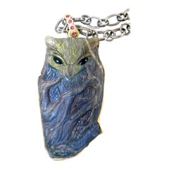 18 karat Handcarved Spectrolite Owlcat Carving