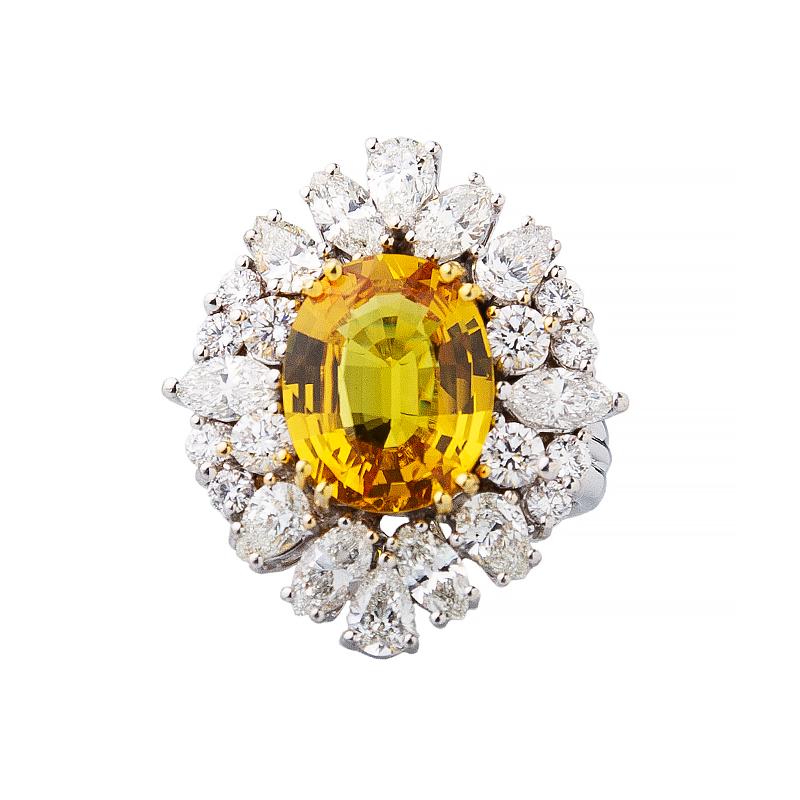 Oval Cut 18 Karat Handcrafted Yellow Sapphire And Diamond Ring For Sale