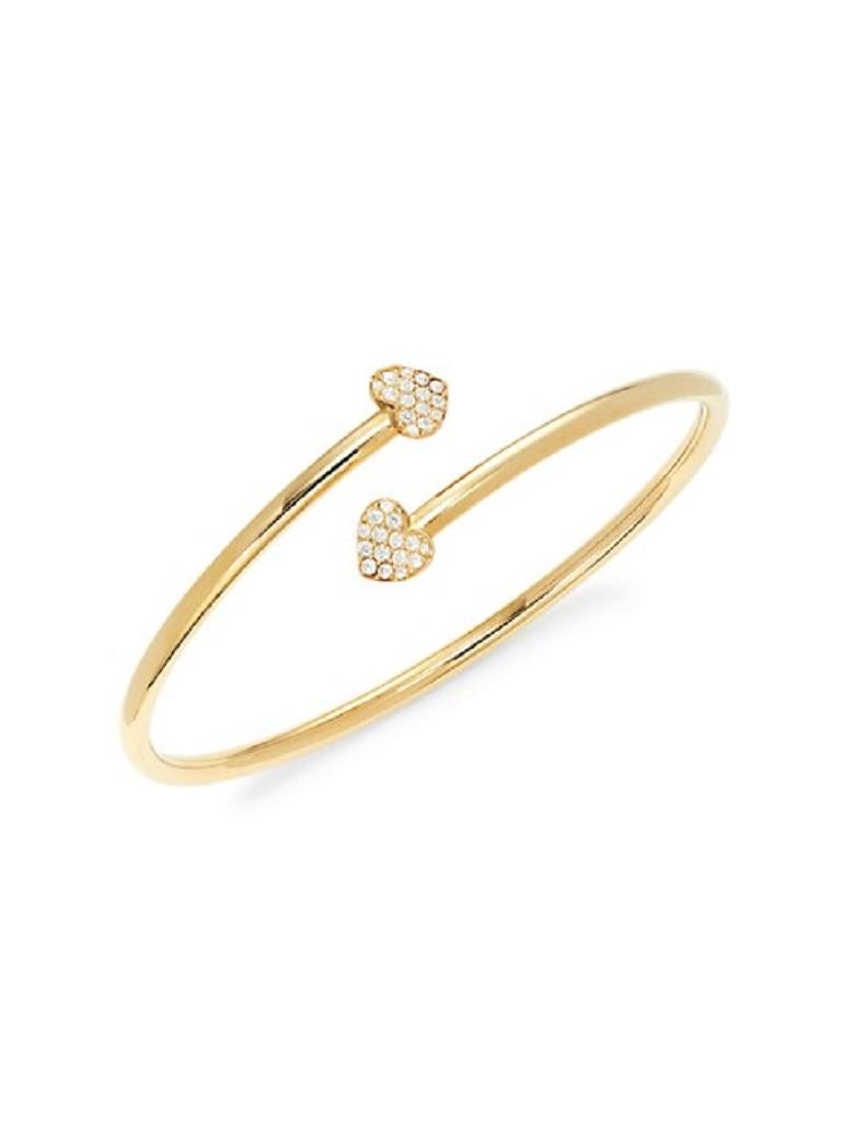 Designed with a hint of whimsy, the Hearts Collection includes pieces, in 18k gold with diamond accents that can be worn individually or stacked together for a romantic and playful everyday look

