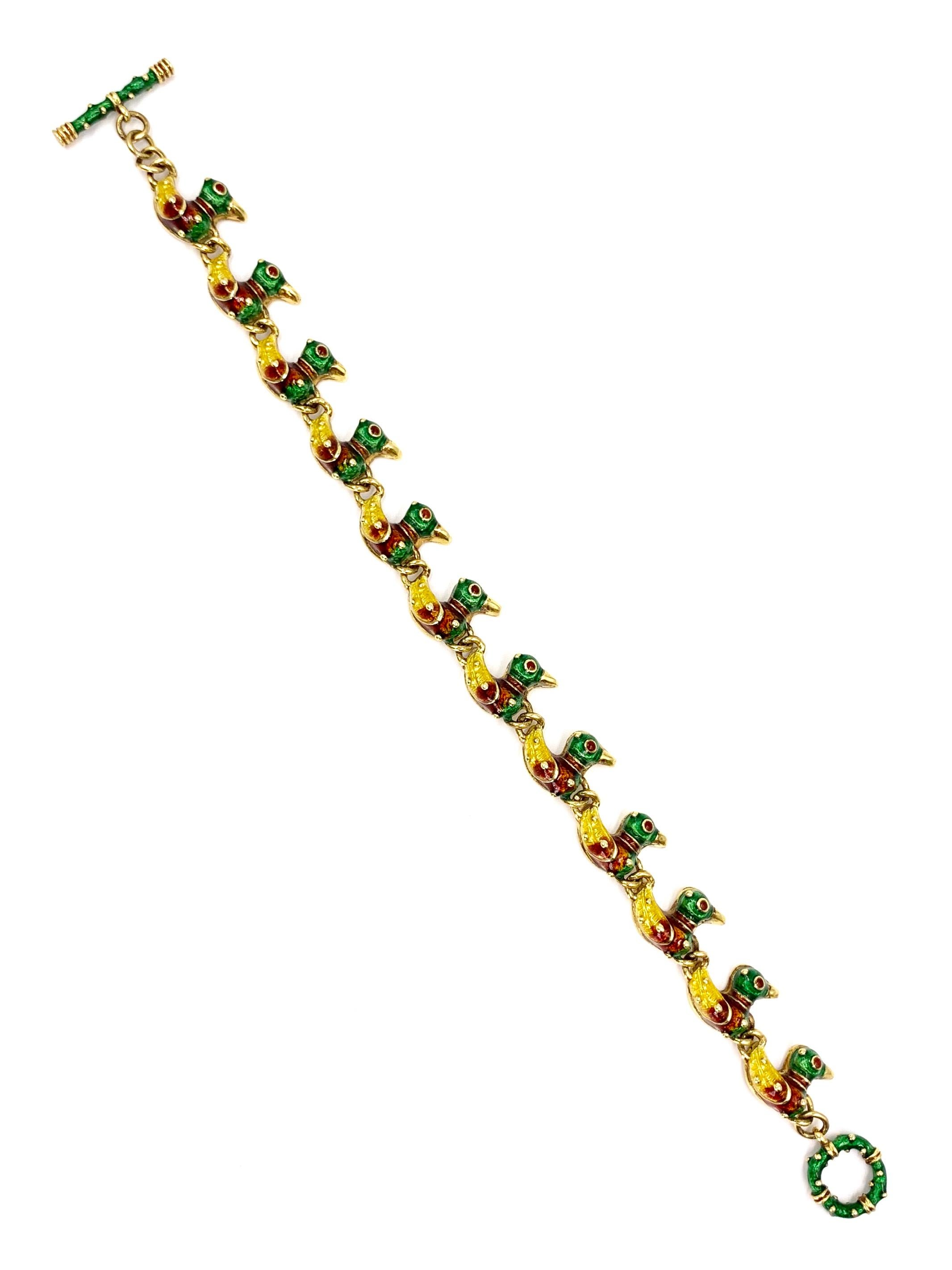 Made by expert enamel fine jewelry designer, HIDALGO. This 18 karat yellow gold toggle clasp bracelet features 12 adorable mallard duck links with hand painted golden yellow, auburn brown and forest green enamel. Ducks measure 10mm from top of head