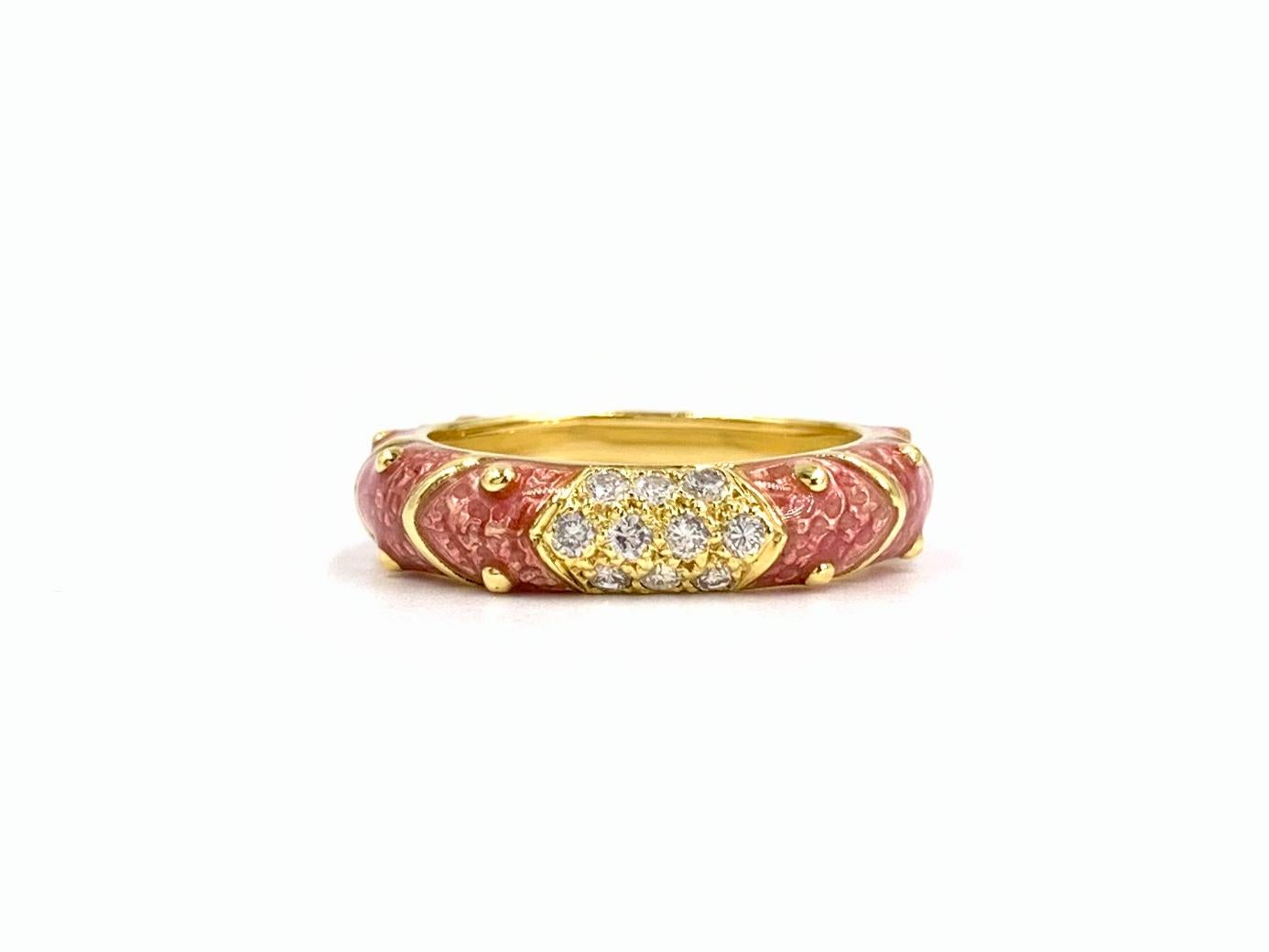 Created with superior quality by expert enamel and precious metal Italian jewelry designer, HIDALGO. This 18 karat yellow gold 5mm slightly rounded band features hand painted light pink enamel, a pave section of diamonds with the signature Hidalgo