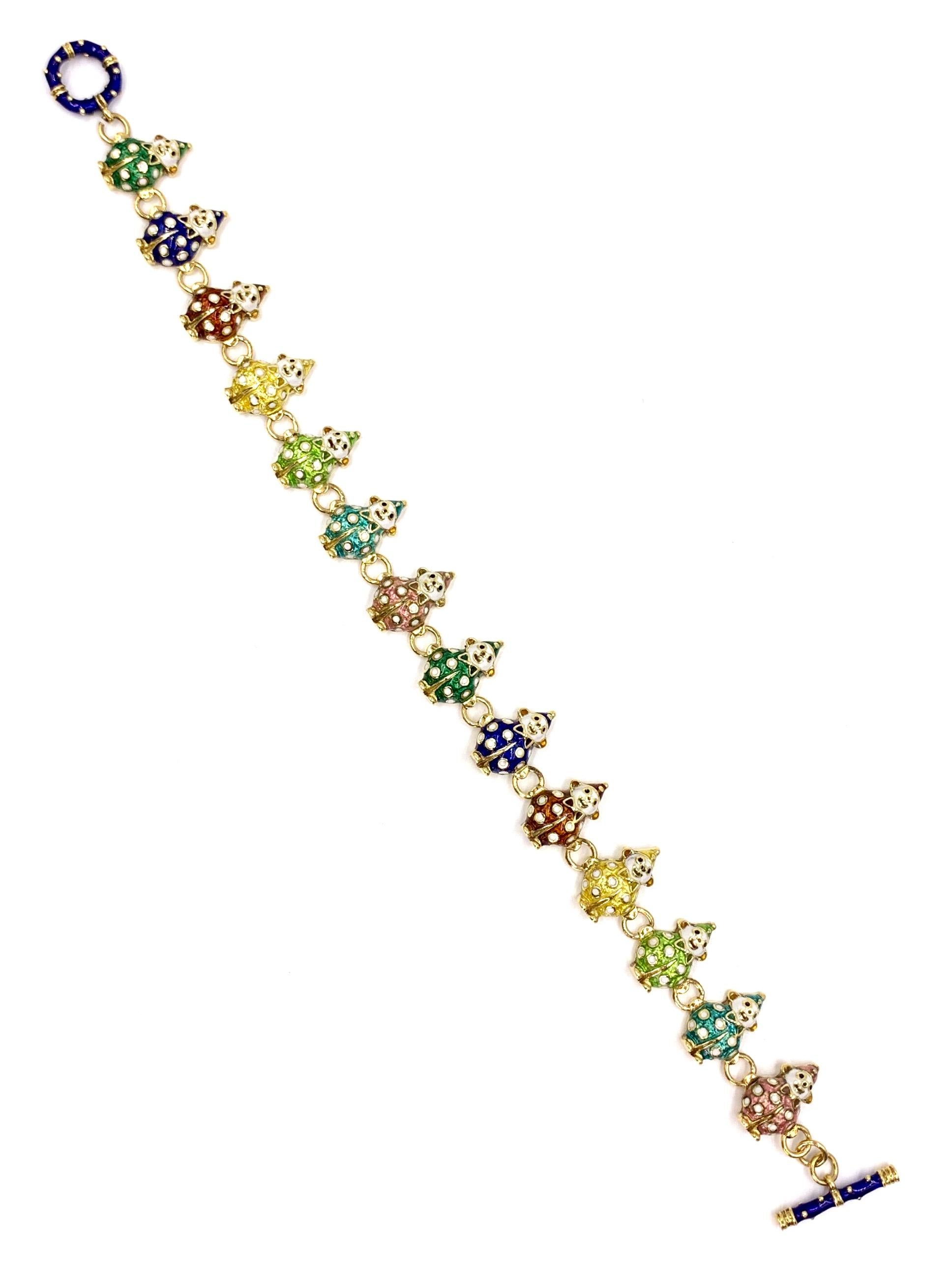 Made by expert enamel fine jewelry designer, HIDALGO. This heavy 18 karat yellow gold toggle clasp bracelet features 14 adorable clown links, each with a hand painted suit and matching hat, colors include: golden yellow, forest green, royal blue,