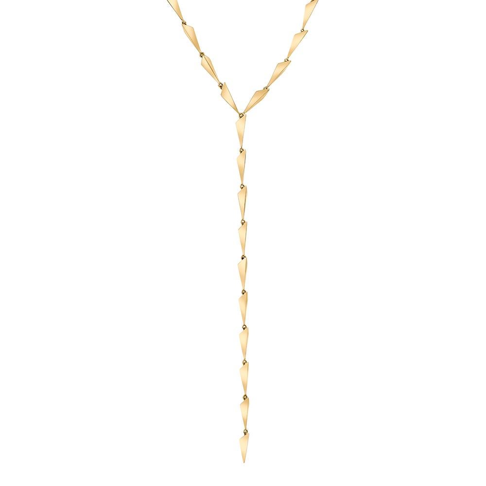 18k Yellow Gold Isosceles Necklace features solid yellow gold three dimensional geometric pyramids that lay flat against the body linked around the neck to form a lariat drop.
18k Yellow Gold
Includes lobster clasp closure at back of the neck. 
From