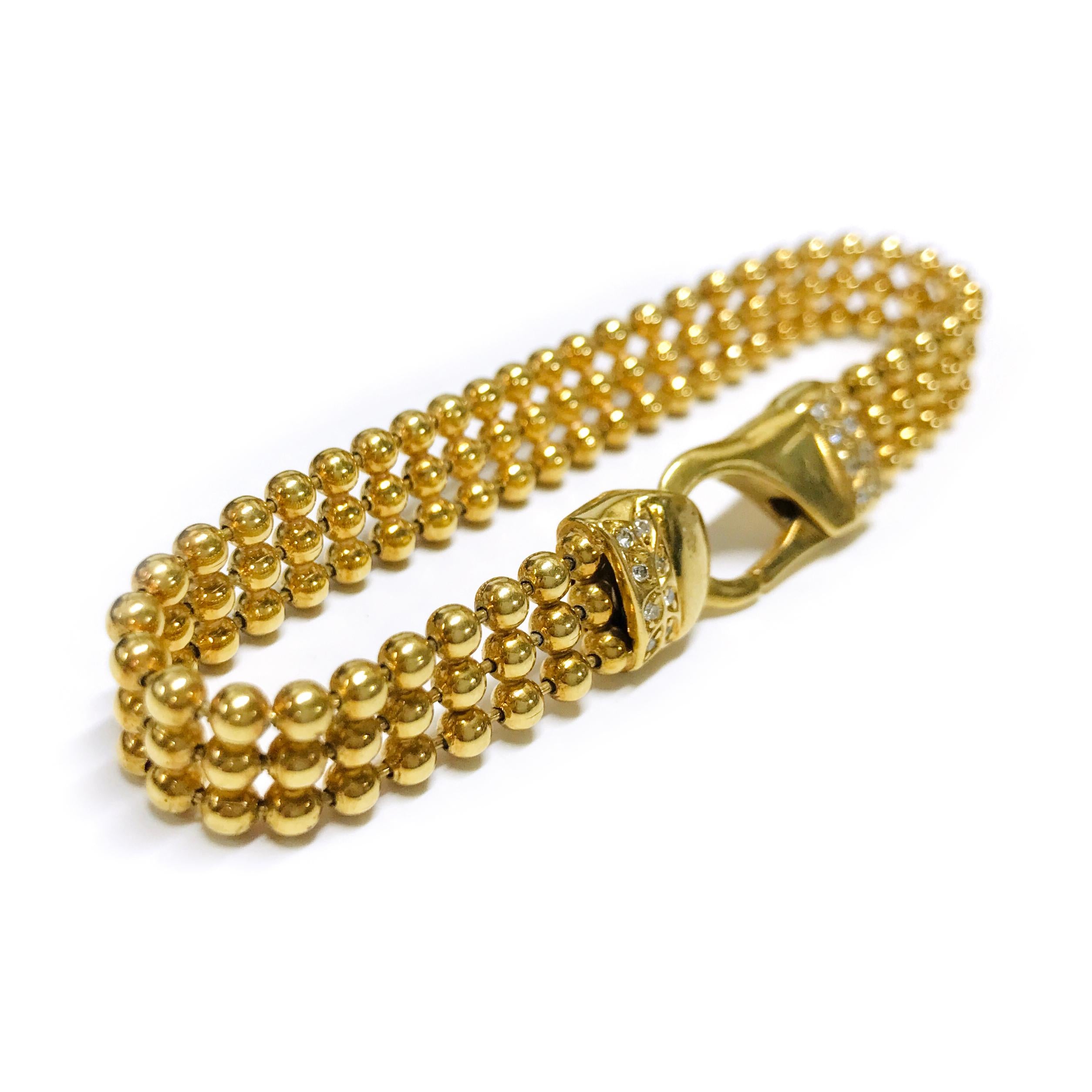 18 Karat Italian Diamond Bead Bracelet. This bracelet features three rows of beaded chain and eight pave-set round diamonds on each clasp end for a total of sixteen diamonds. The beads have a smooth shiny finish and the bracelet is 9.1mm wide. The