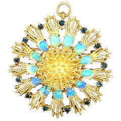 18 Karat La Triomphe Opal and Sapphire Sunburst Pendant and Pin