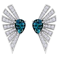18 Karat Labyrinth White Gold Earring with Vs-Gh Diamonds and Blue Topaz