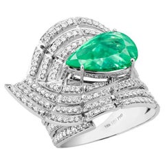 Anello Labirinto in oro bianco 18 carati con diamanti Vs-Gh e smeraldo verde