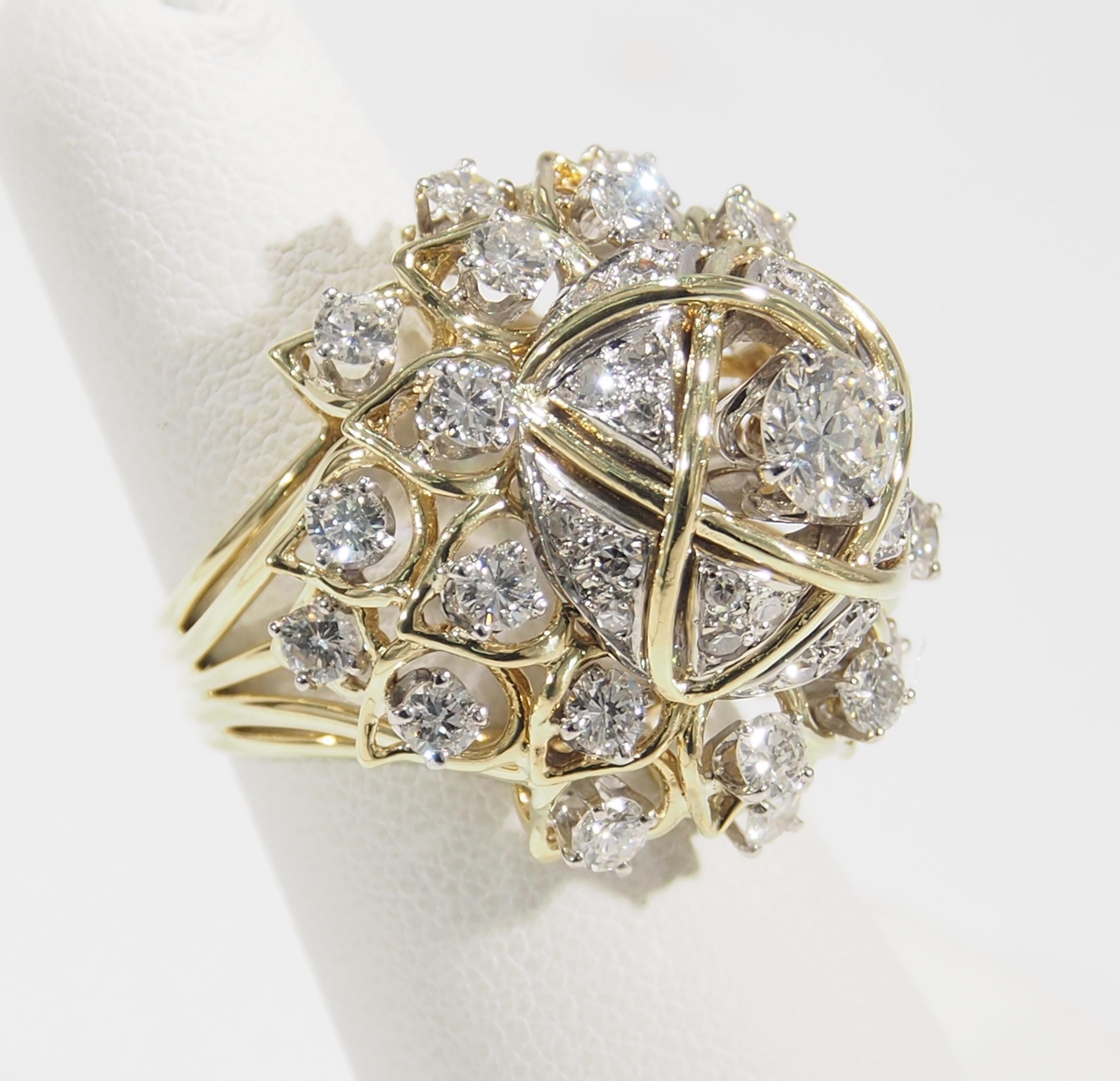 This is a magnificent 18K Yellow Gold Ring fashioned with a 1 inch Dome set with sparkling Diamonds. The Dome is designed with strands of Gold accented with (81) Round Brilliant Cut Diamonds, approximately 3.92ctw, G-I in Color, VS in Clarity.  A