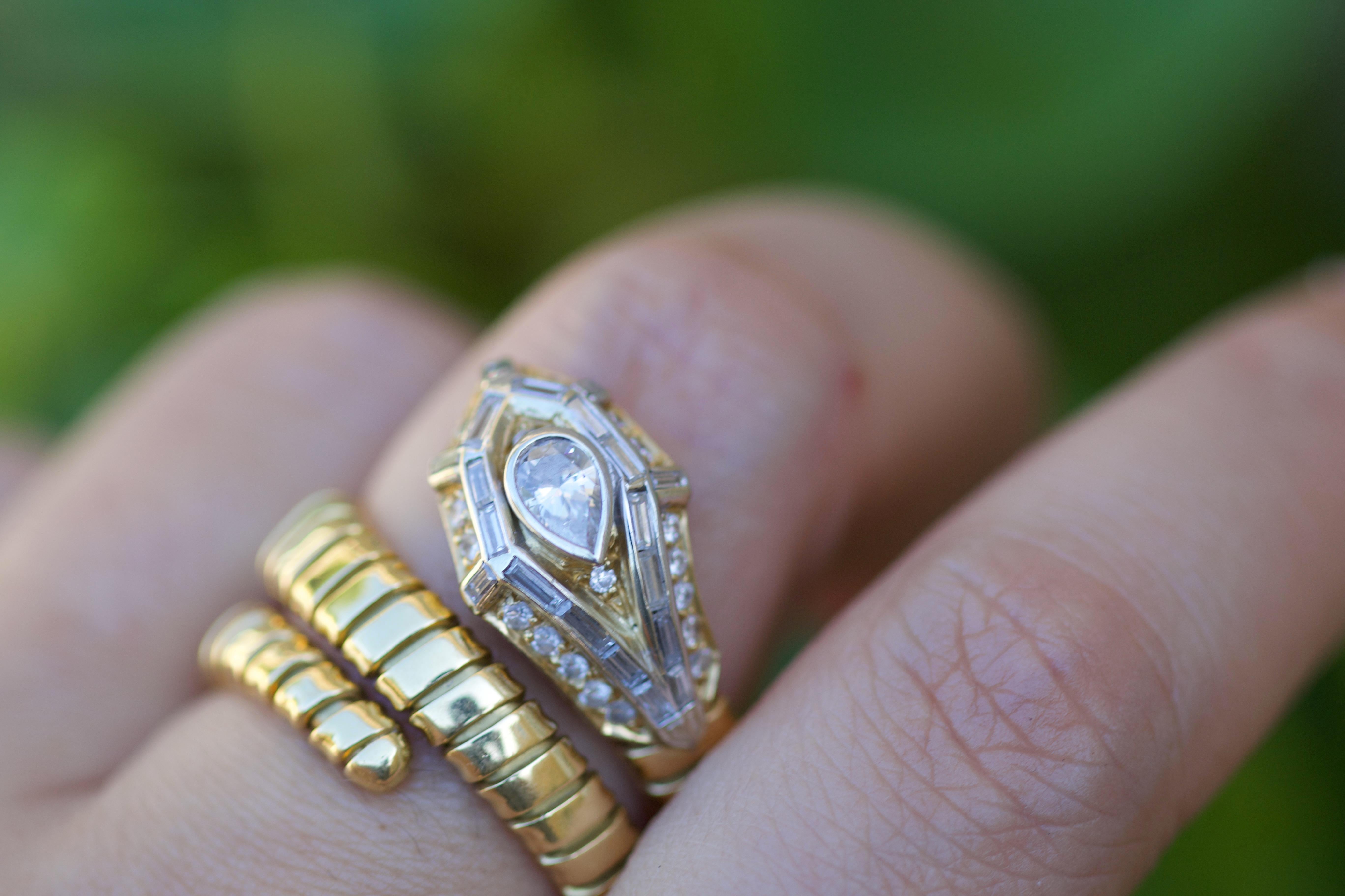 Pear Cut 18 Karat Late 20th Century Gold Tubogas Diamond Snake Crossover Ring