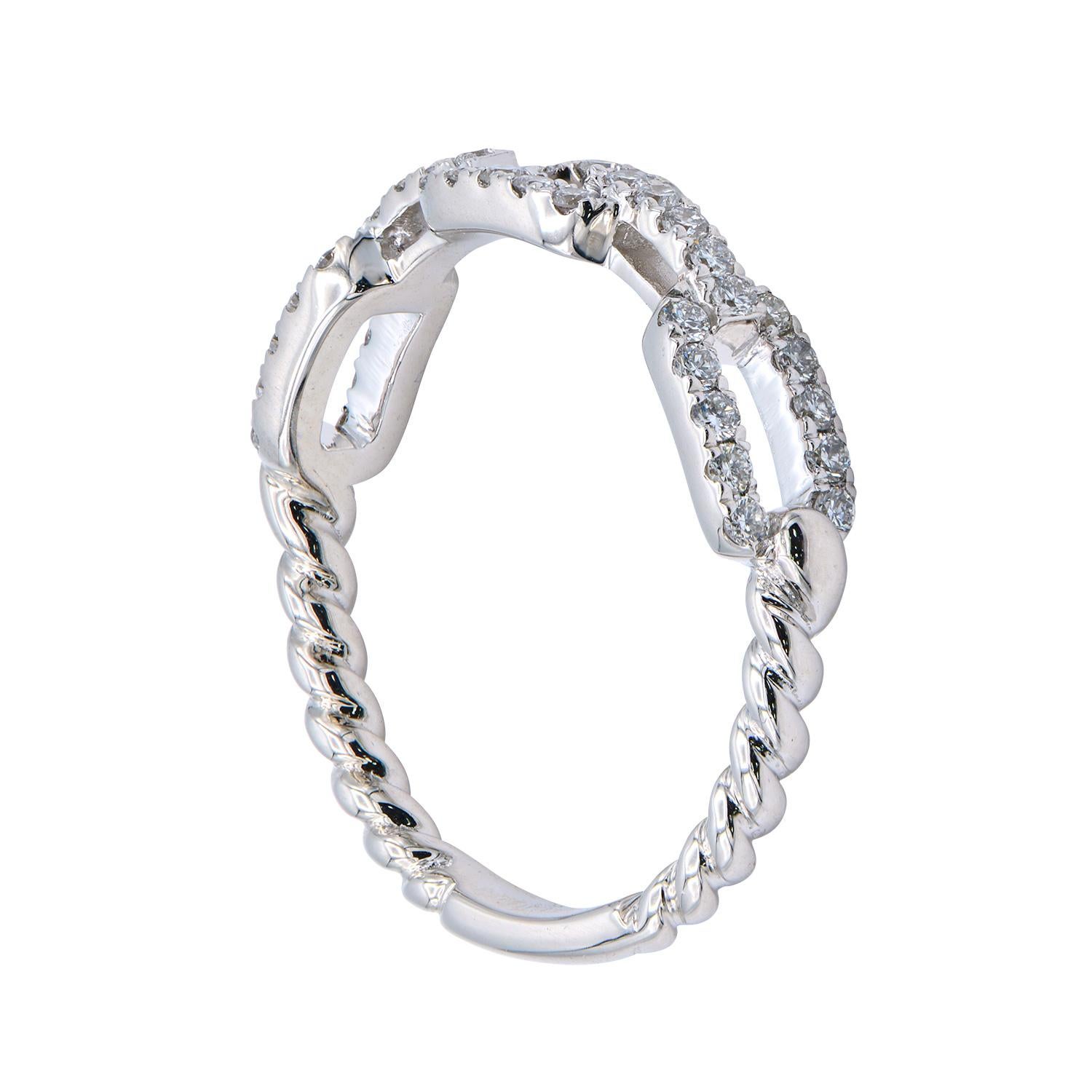 This modern fun ring is made from 2.5 grams of 18 karat white gold. The back of the ring looks like a twist and the front of the ring looks like necklace links put together and covered with 40 round VS2, G color diamonds totaling 0.31 carats. This