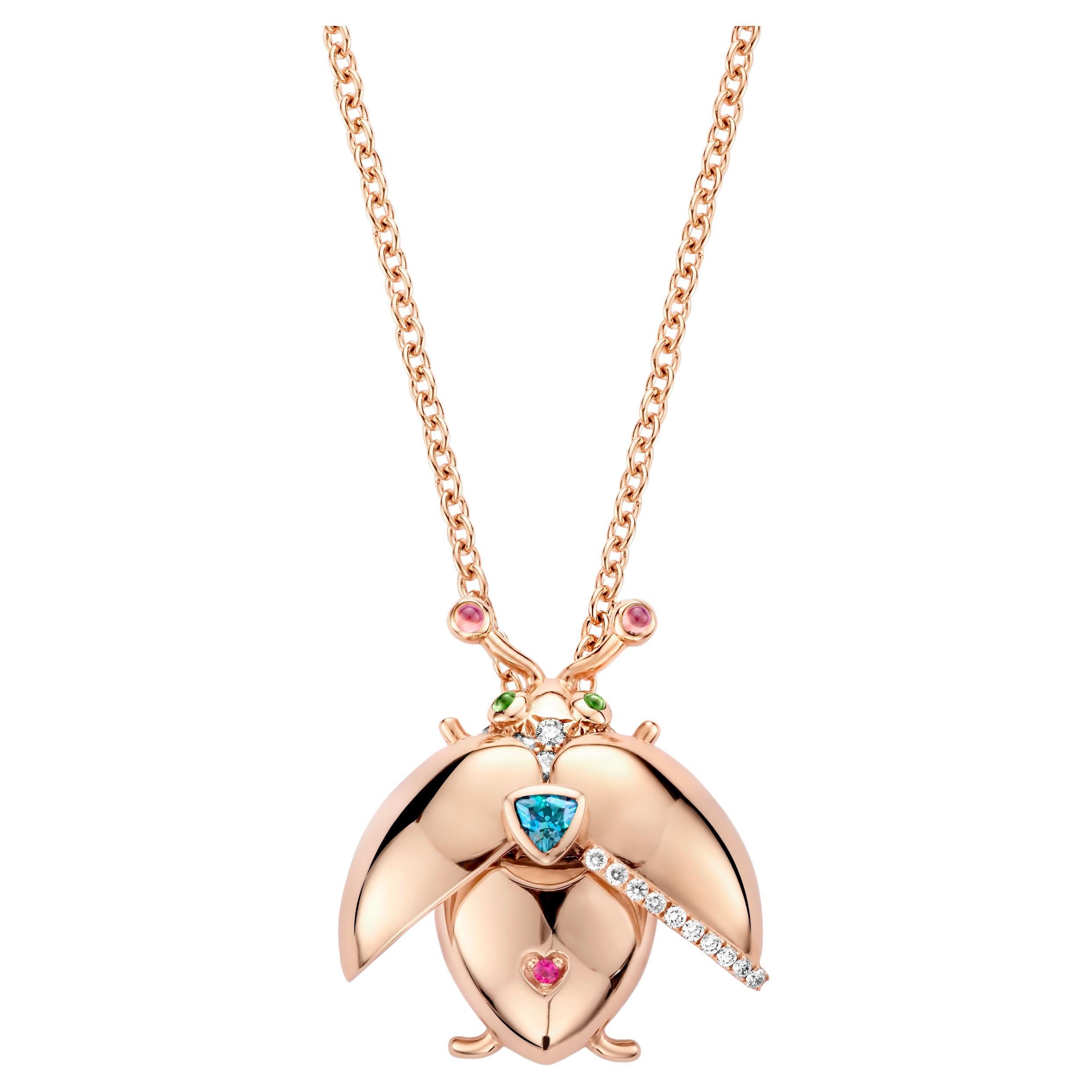 One of a kind lucky beetle necklace in 18K rose gold 11g set with the finest diamonds in brilliant cut 0,37Ct (VVS/DEF quality) one natural, indigolite tourmaline in triangel cut and a pink sapphire in brilliant cut. The feelers and the eyes are set