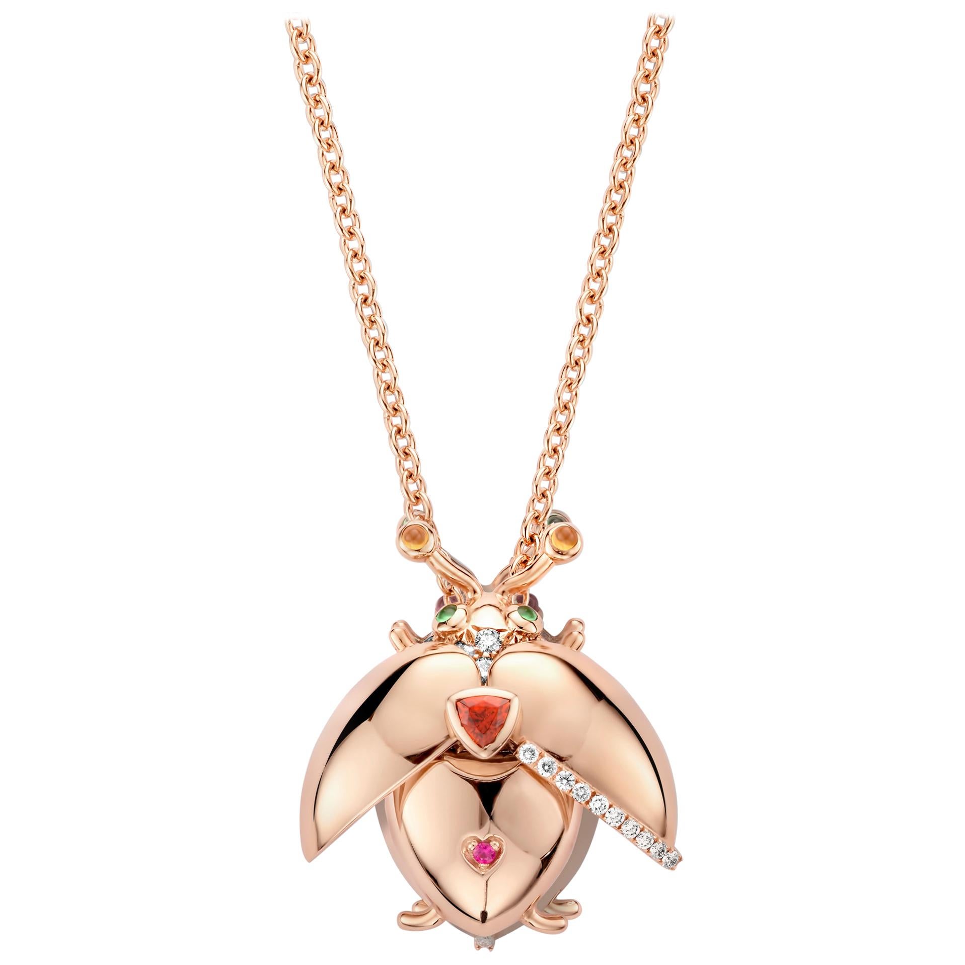 One of a kind lucky beetle necklace in 18K rose gold 11g set with the finest diamonds in brilliant cut 0,37Ct (VVS/DEF quality) one natural, mandarine garnet in triangel cut and a pink sapphire in brilliant cut. The feelers and the eyes are set with