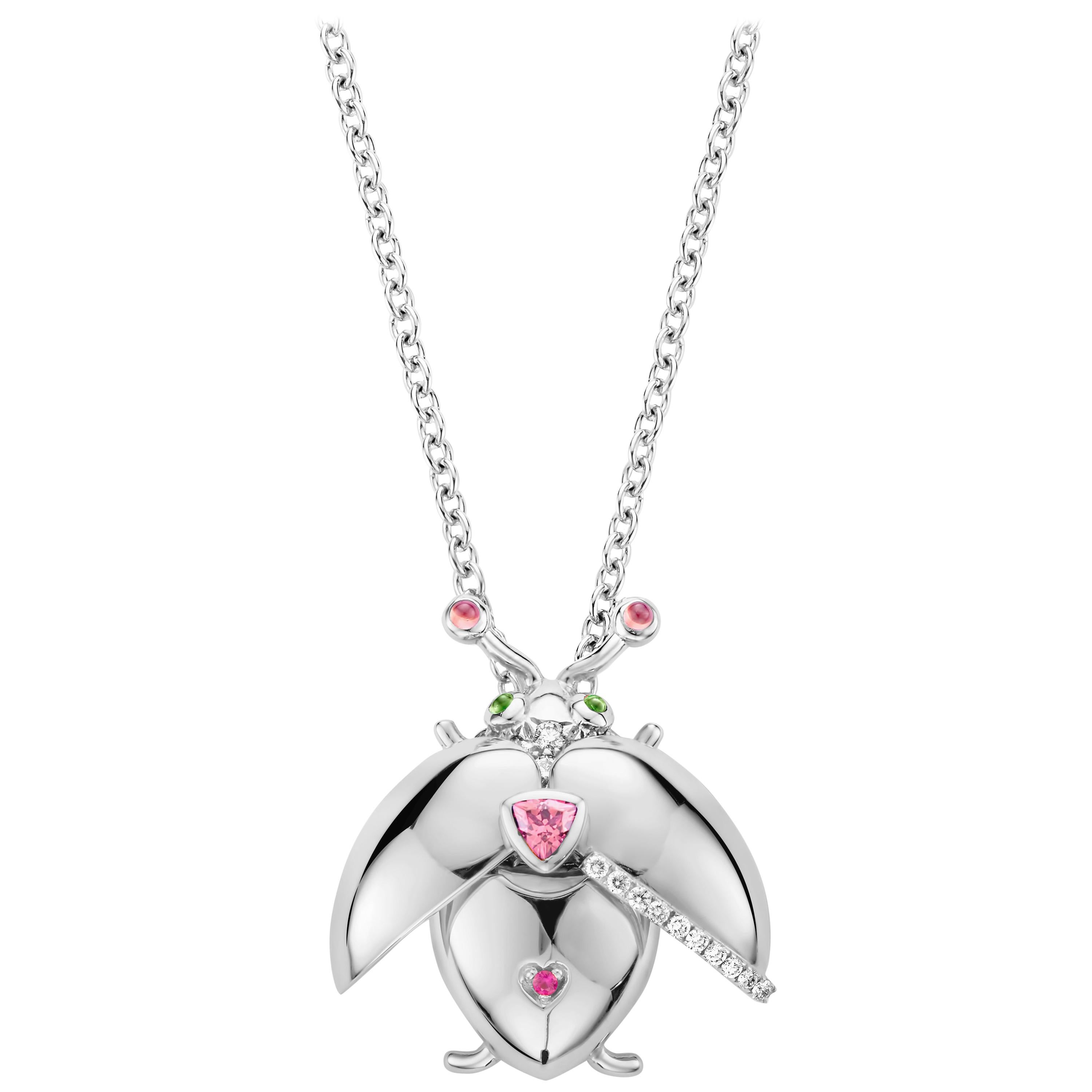 One of a kind lucky beetle necklace in 18K white gold 11g set with the finest diamonds in brilliant cut 0,37Ct (VVS/DEF quality) one natural, pink tourmaline in triangle cut and a pink sapphire in brilliant cut. The feelers and the eyes are set with