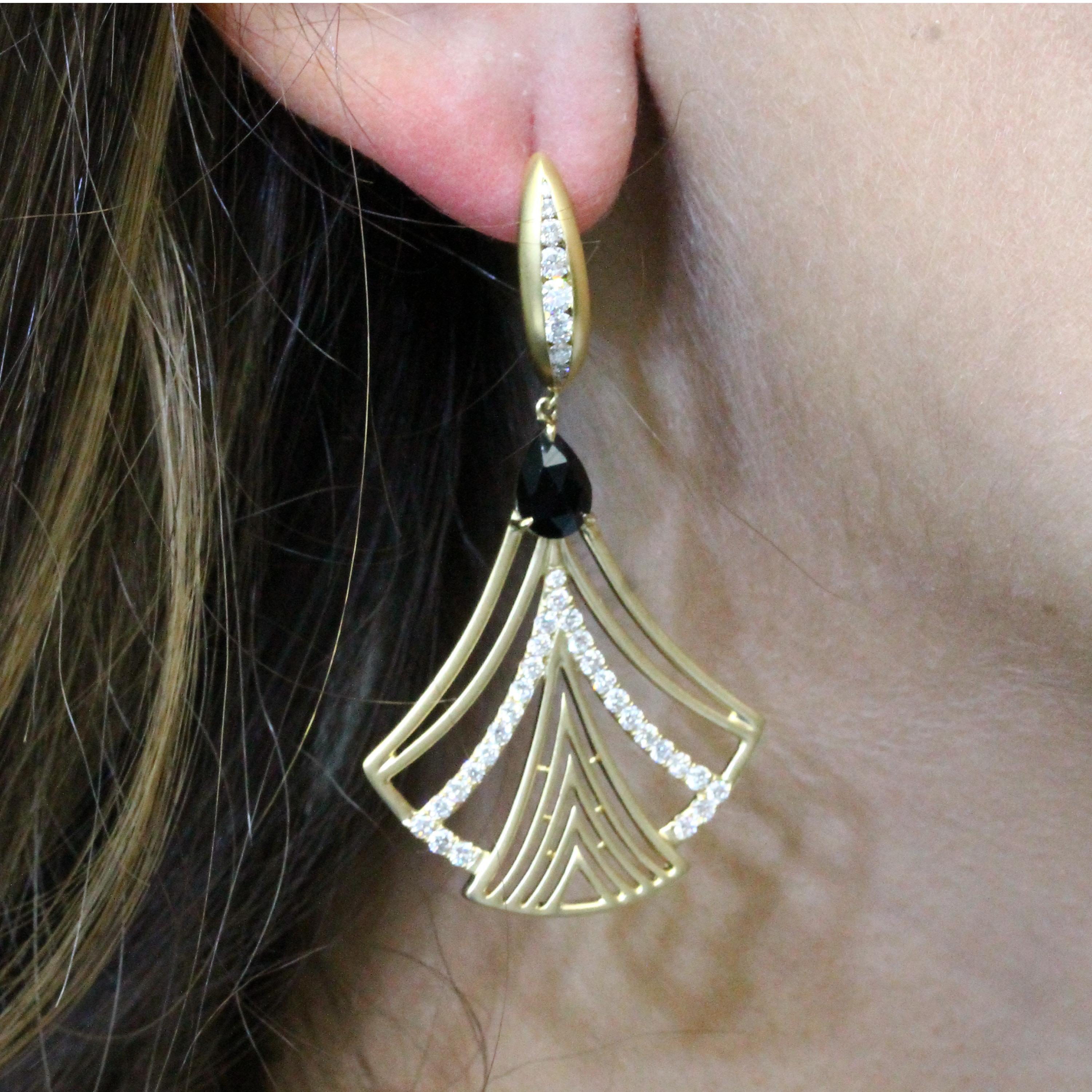 Art Deco style Earrings featuring Pear Shape Black Onyx and Diamonds, set in 18K Matte Yellow Gold. Earrings hang from Matte Gold Diamond Huggie-Tops. The Gatsby collection from Doves by Doron Paloma features exquisite art-deco inspired pieces,