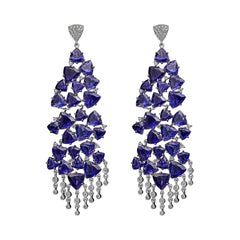18 Karat Mirage White Gold Earring with Vs Gh Diamonds and Blue Tanzanite