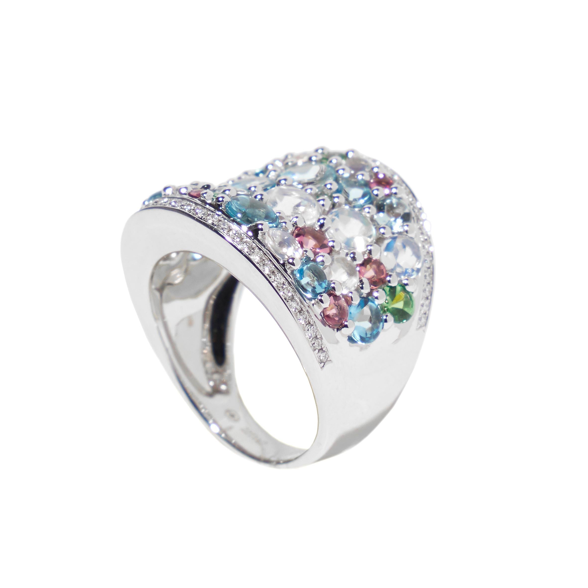 Modern 18 karat mixed gem ring with pink blue and rainbow moonstones For Sale