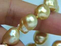18 Karat Natural South Sea Golden Pearls Necklace 1.50 Carat Diamond Clasp*