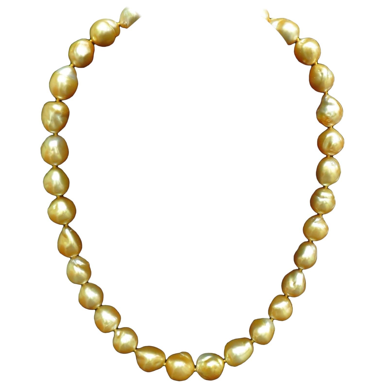 18 Karat Natural South Sea Golden Pearls Necklace 1.50 Carat Diamond Clasp For Sale