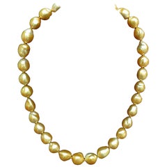 18 Karat Natural South Sea Golden Pearls Necklace 1.50 Carat Diamond Clasp*