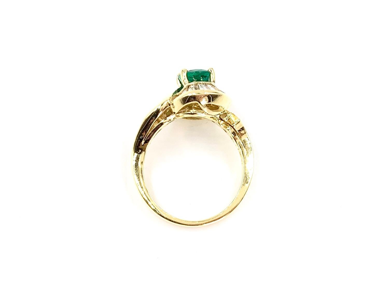 Women's 18 Karat Oval 1.22 Carat Emerald and Diamond Ring For Sale