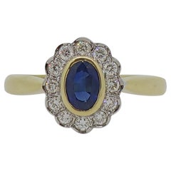 18 Karat Oval Sapphire 
Diamond Edwardian Style Cluster Ring