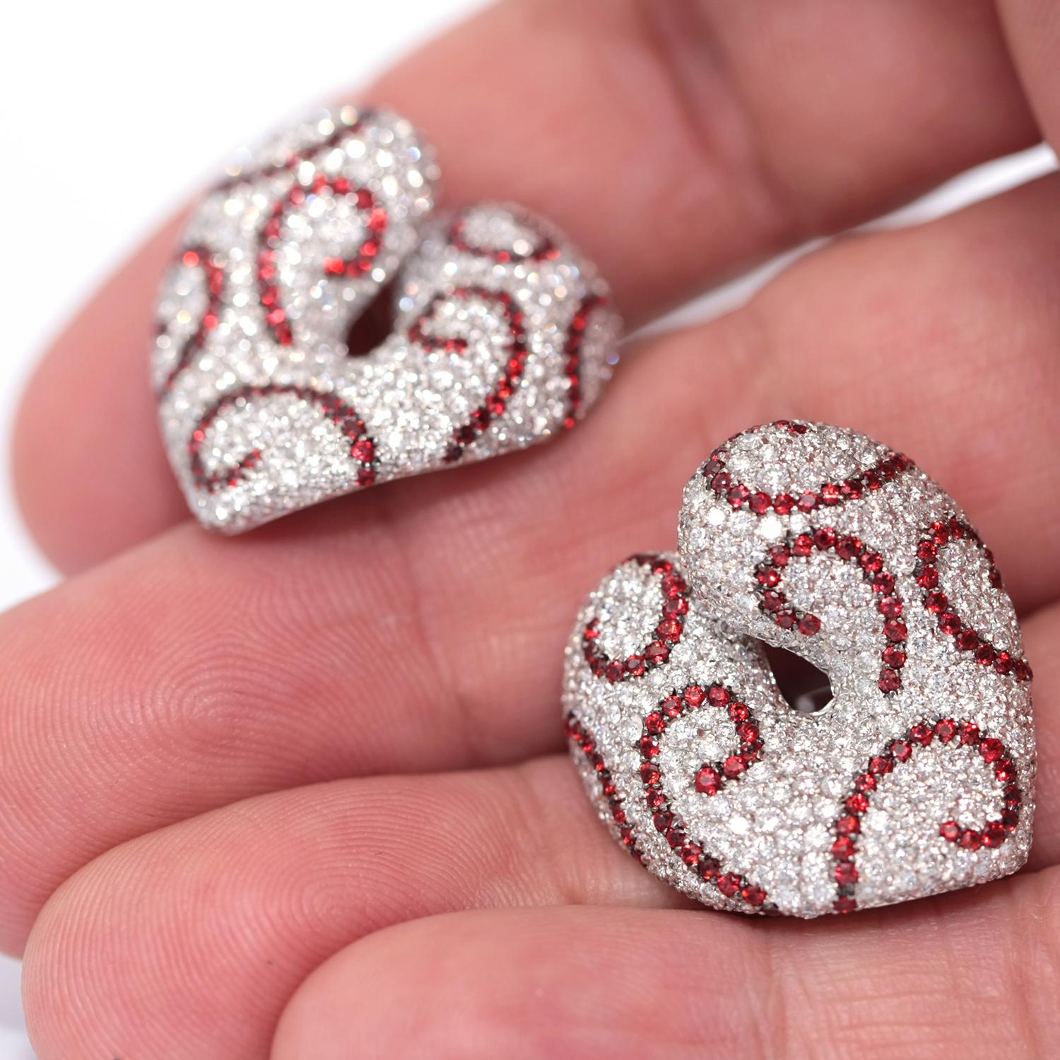 These lavish beautiful earrings,  designed by Italian designer Palmiero are paved with 3.82 carats of full-cut diamonds and 1.73 carats of red sapphires rubies.
White 18k Gold 
Weight: 24.05 Grams
Diamond average color: G
Diamond average clarity: