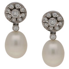 Pearl and Diamond Drop Earrings in 18 Karat Pearl and Diamond Drop Earrings in 18 Karat