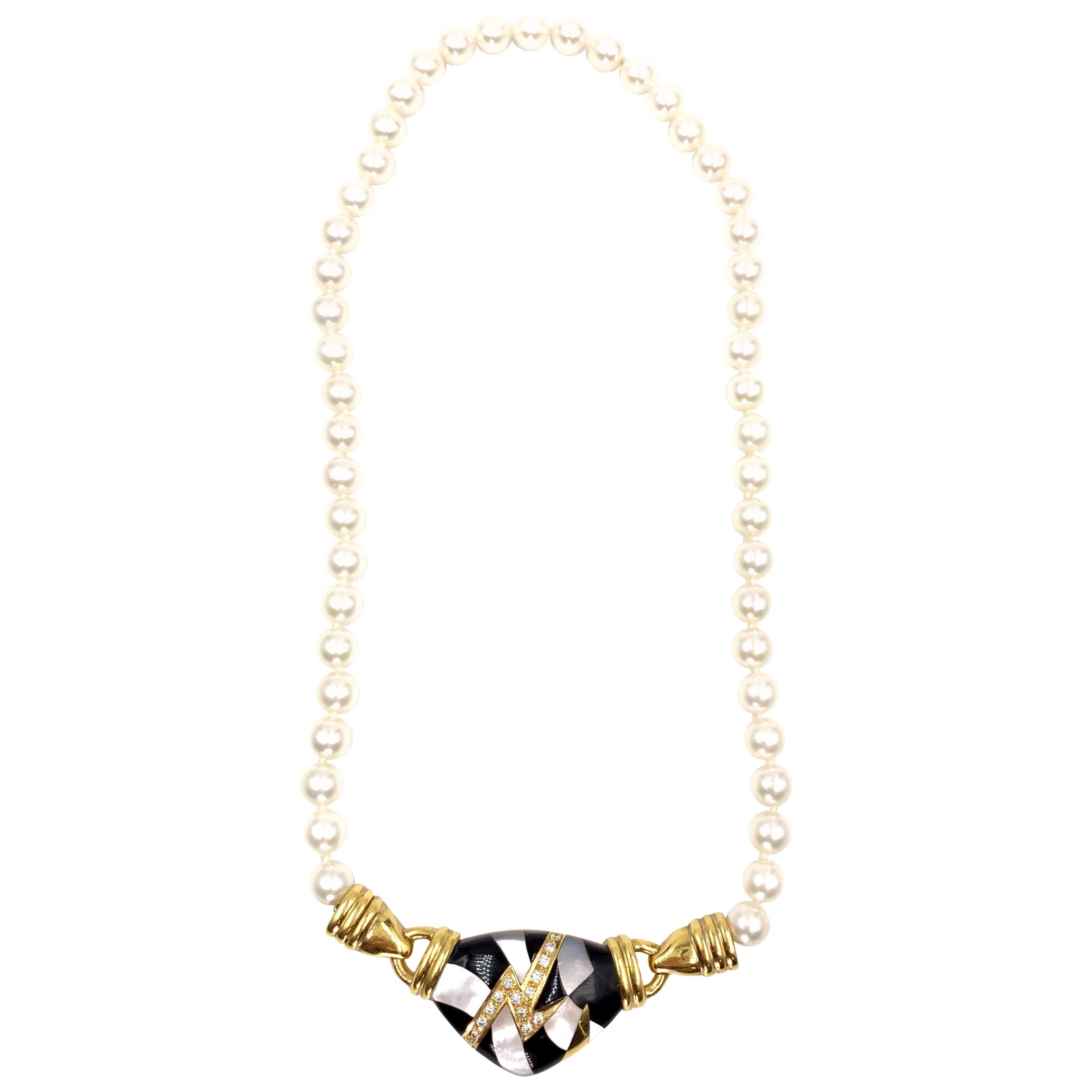18 Karat Pearl Necklace with Diamond and Inlaid Stone Center For Sale