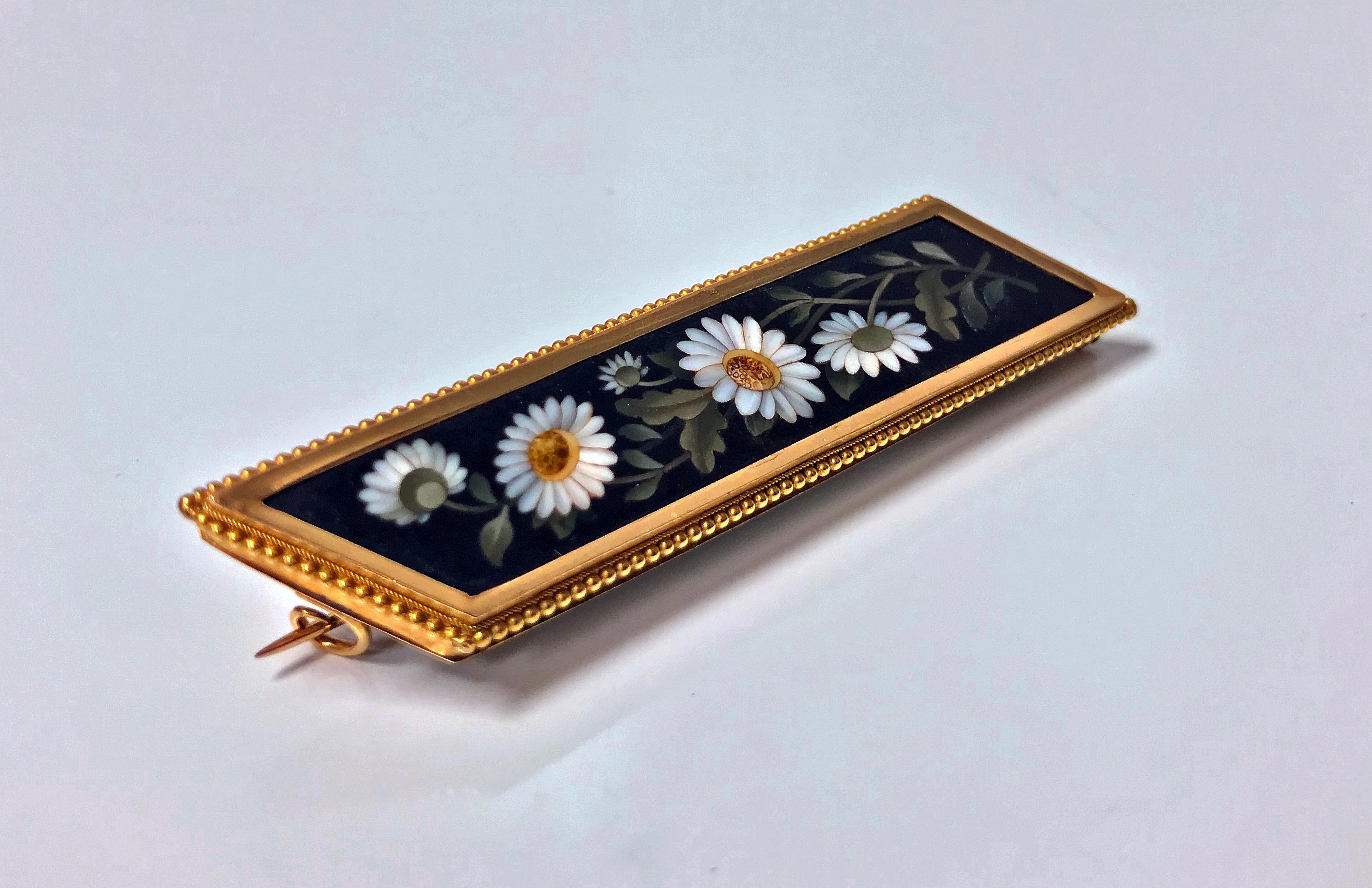 18K Gold Pietra Dura Brooch Pin, Italy C.1875. The quadrilateral shape, fine pietra dura floral white, green, and yellow sunflower inlay colors, the surround very fine gold mount of small bead border. Possible Maker’s mark on catch but  unable to