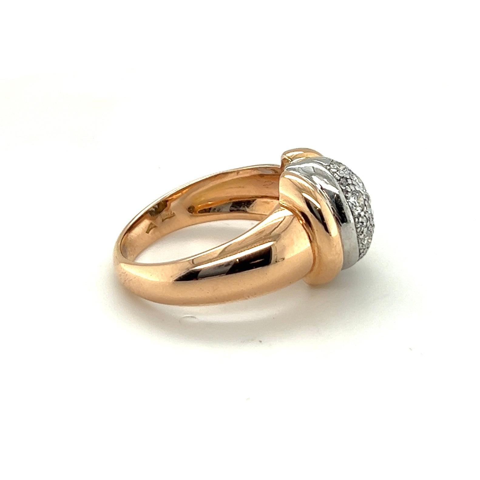 Delightful 18 karat pink and white gold diamond Retro Cocktail ring, circa 1940s. 

Eye-catching pink gold Retro ring, centering upon an elliptical, bombé white gold element, set with 15 circular-cut diamonds totalling circa 0.4 carats, and flanked