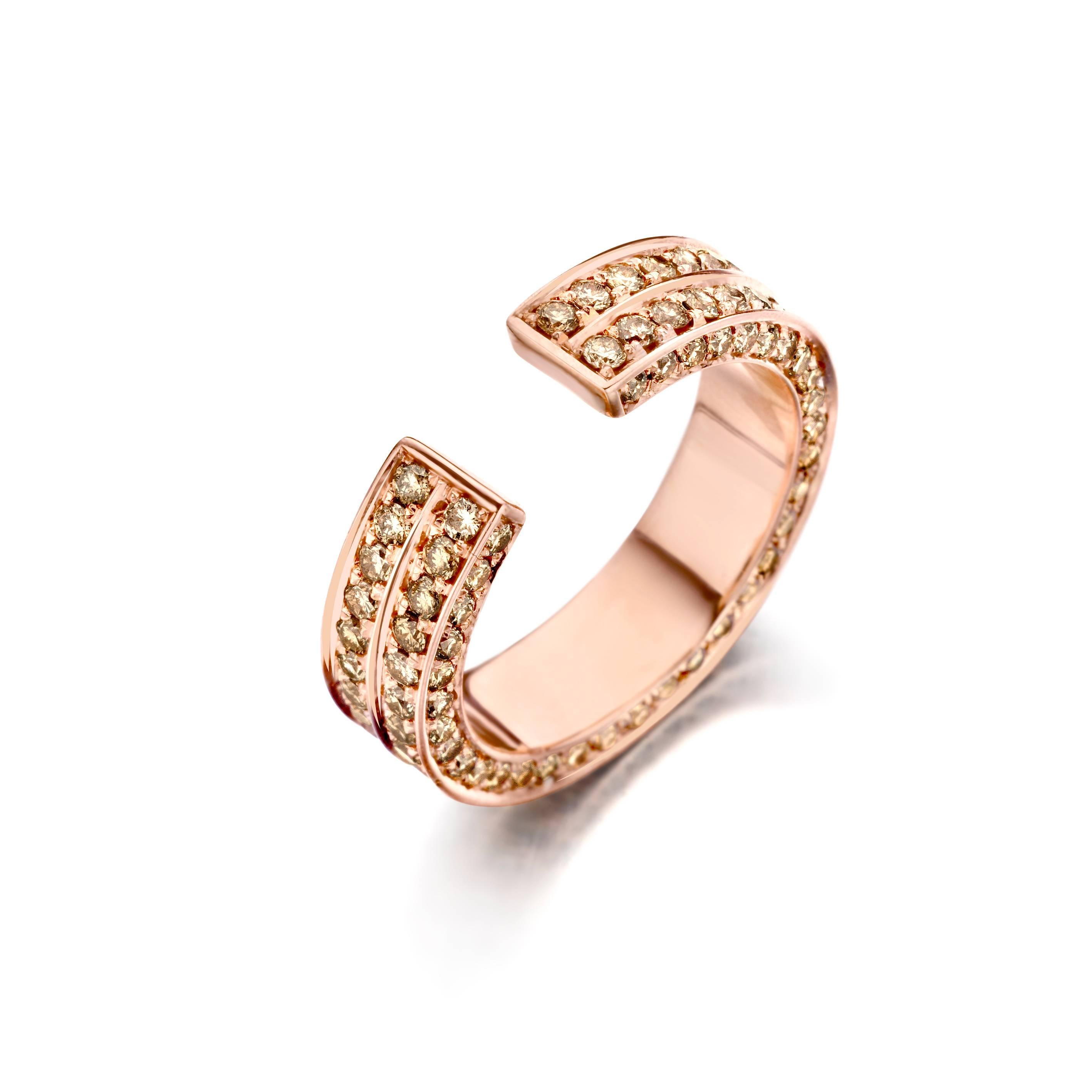 The BRUTE 18-karat rose gold ring has the appearance of two styles stacked together. Expertly handset with 2.43ct natural brown diamonds, this piece is sure to sparkle from all angles. The rose gold band wraps symmetrically around the finger and