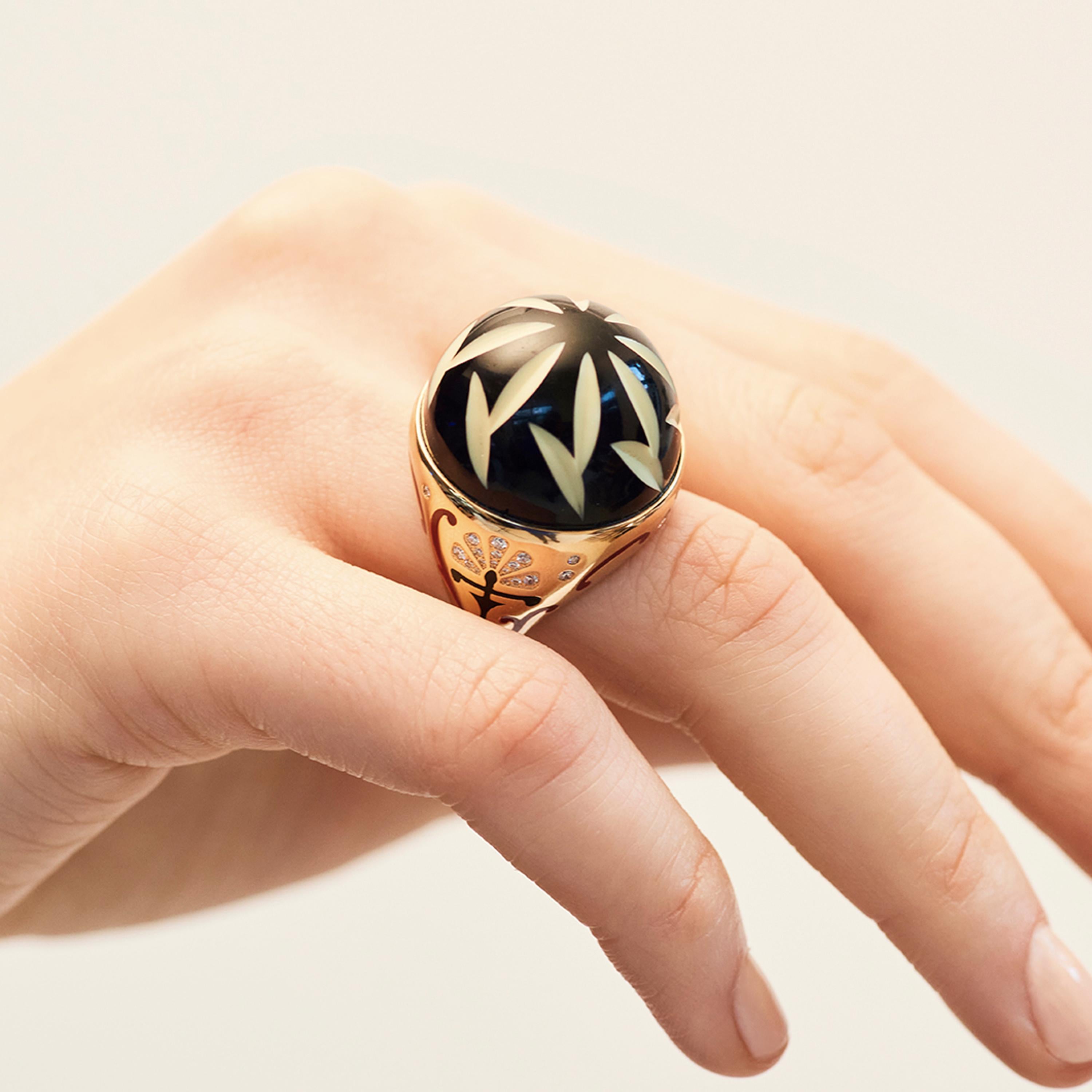 Francesca Villa's Art Deco Style Black Flower Ring is crafted from 18 karat pink gold (14.50 g), diamonds (0.25 cts), as well as an enamel Art Deco black and cream celluloid button.

Ring size UK: N
Ring size EU: 53
Ring size US: 6.75

For many