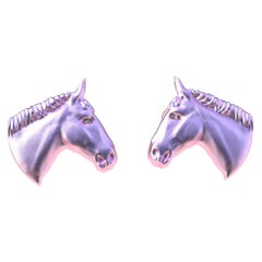 Boutons de manchette cheval en or rose 18 carats et diamants