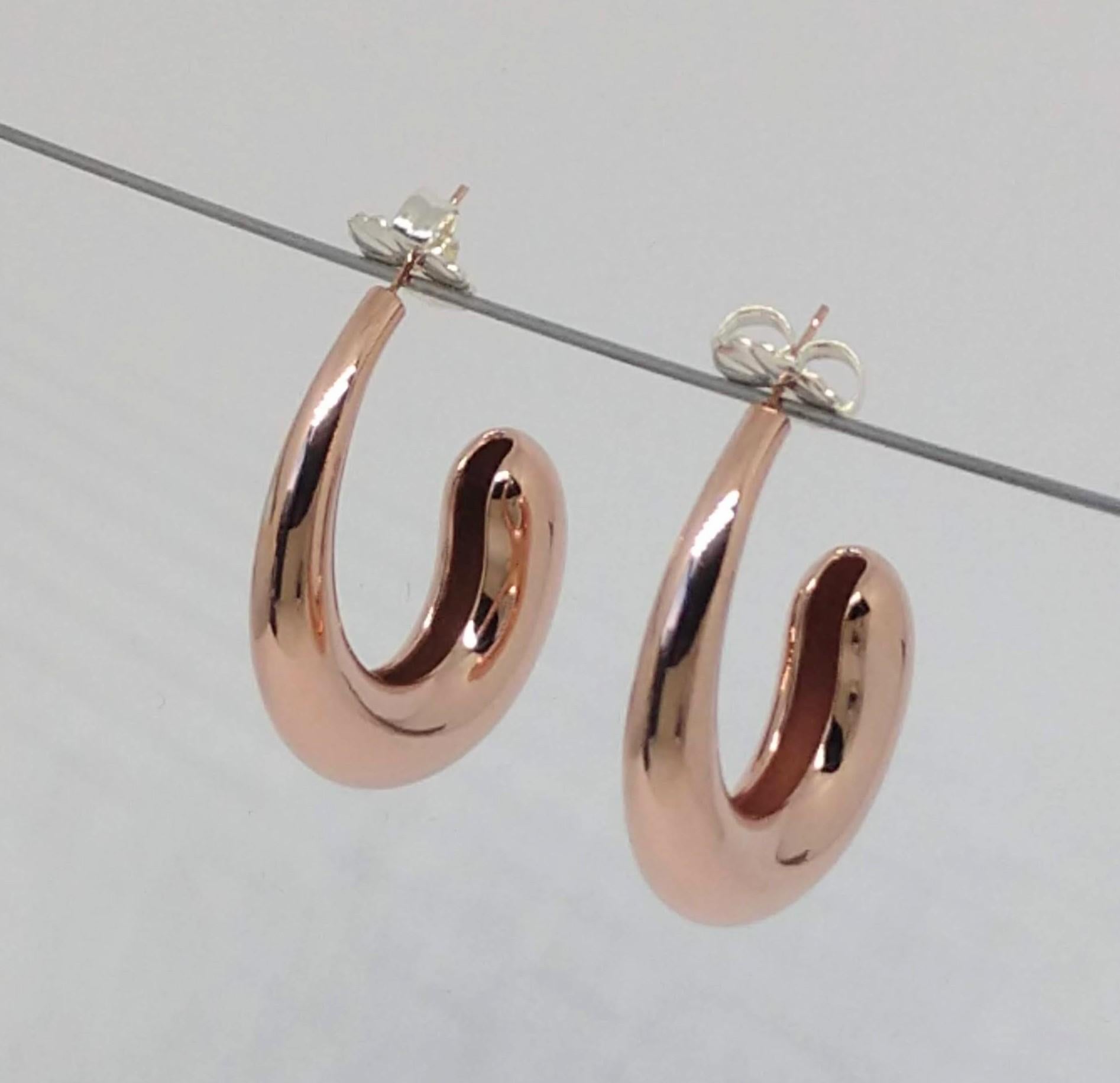 18 Karat Pink Gold Vermeil  C Hoop Teardrop Earrings, Keep it simple silly. KISS. Or less is more. This design can last you 20 years or more. Designing for Tiffanys taught me the essence of the subblime. 
These are hollow hoops 3d printed