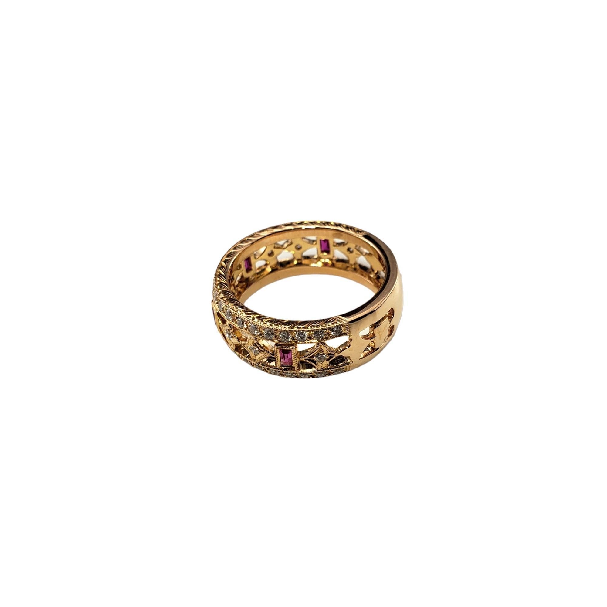 Vintage 18 Karat Pink Sapphire and Diamond Ring Size 6.25 JAGi Certified-

Cet élégant bracelet présente quatre saphirs roses naturels de taille émeraude et 58 diamants ronds de taille brillant, sertis dans de l'or jaune 18 carats magnifiquement