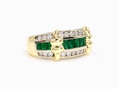 18 Karat and Platinum Emerald and Diamond Channel Set Ring