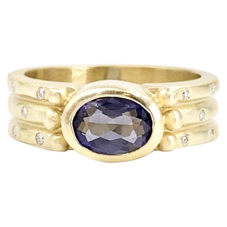 18 Karat Purple Iolite and Diamond Ring For Sale