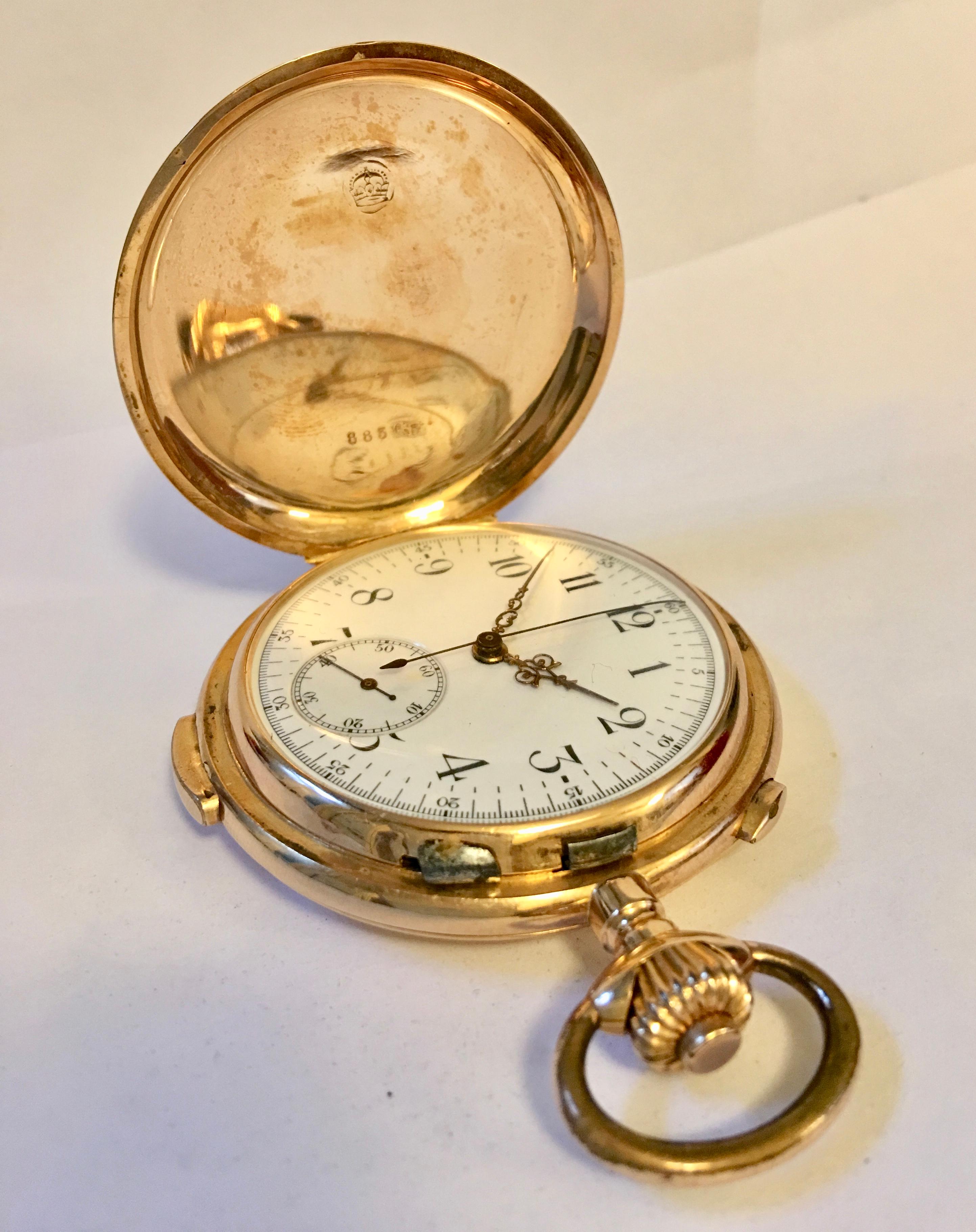 A superb quality full hunter 18-karat gold chronograph quarter repeater pocket watch, crown wind movement, a very clean circular white enamel with Arabic numerals and a subsidiary seconds dial. With minute divisions and an outer 1/5th second