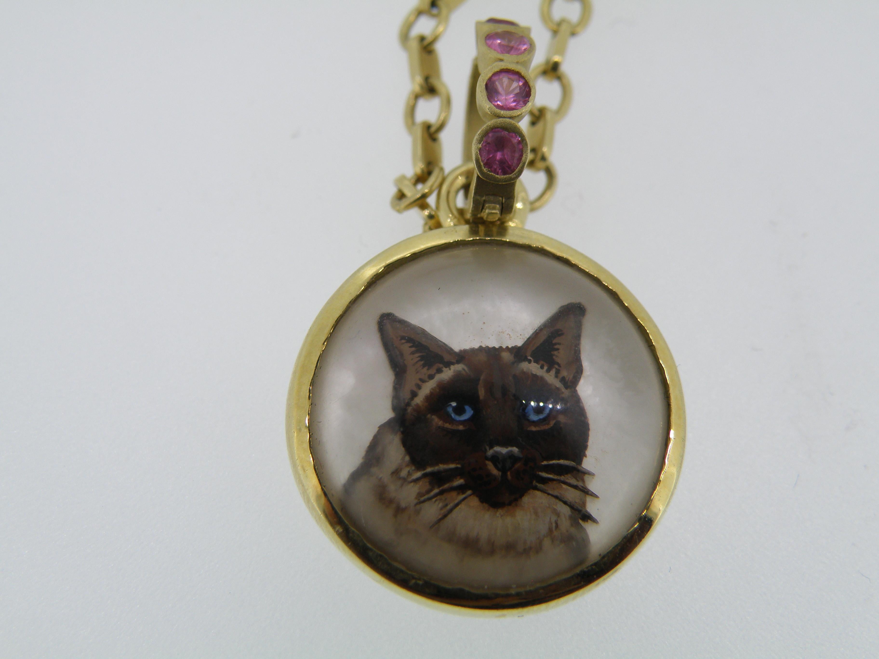 15 mm round Reverse crystal hand painted cat pendant with sapphire bail.