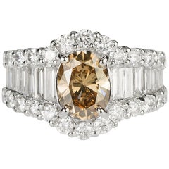18 Karat Ring with Oval Champagne Diamond