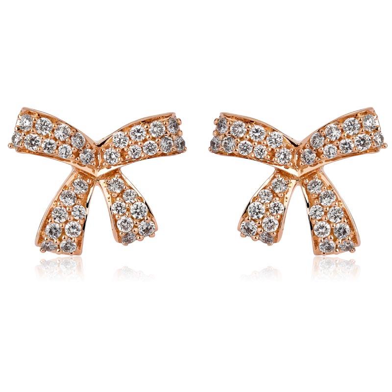 Flirtatious and enchanting, the Romance collection comprises an assortment of charming motifs like bows, embellished in pearl and diamonds. With an air of understated elegance, the jewelry here allows you to express yourself in the most effortless