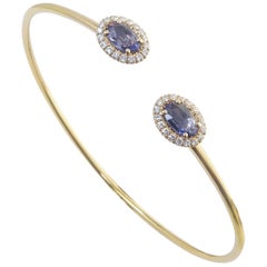18 Karat Rose Gold 0.22 Carat White Diamonds 0.80 Carat Blue Sapphire Bangle