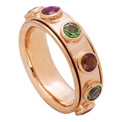 Anello in oro rosa 18 carati con tormalina e granato di 1 carato con design a fascia senza stress