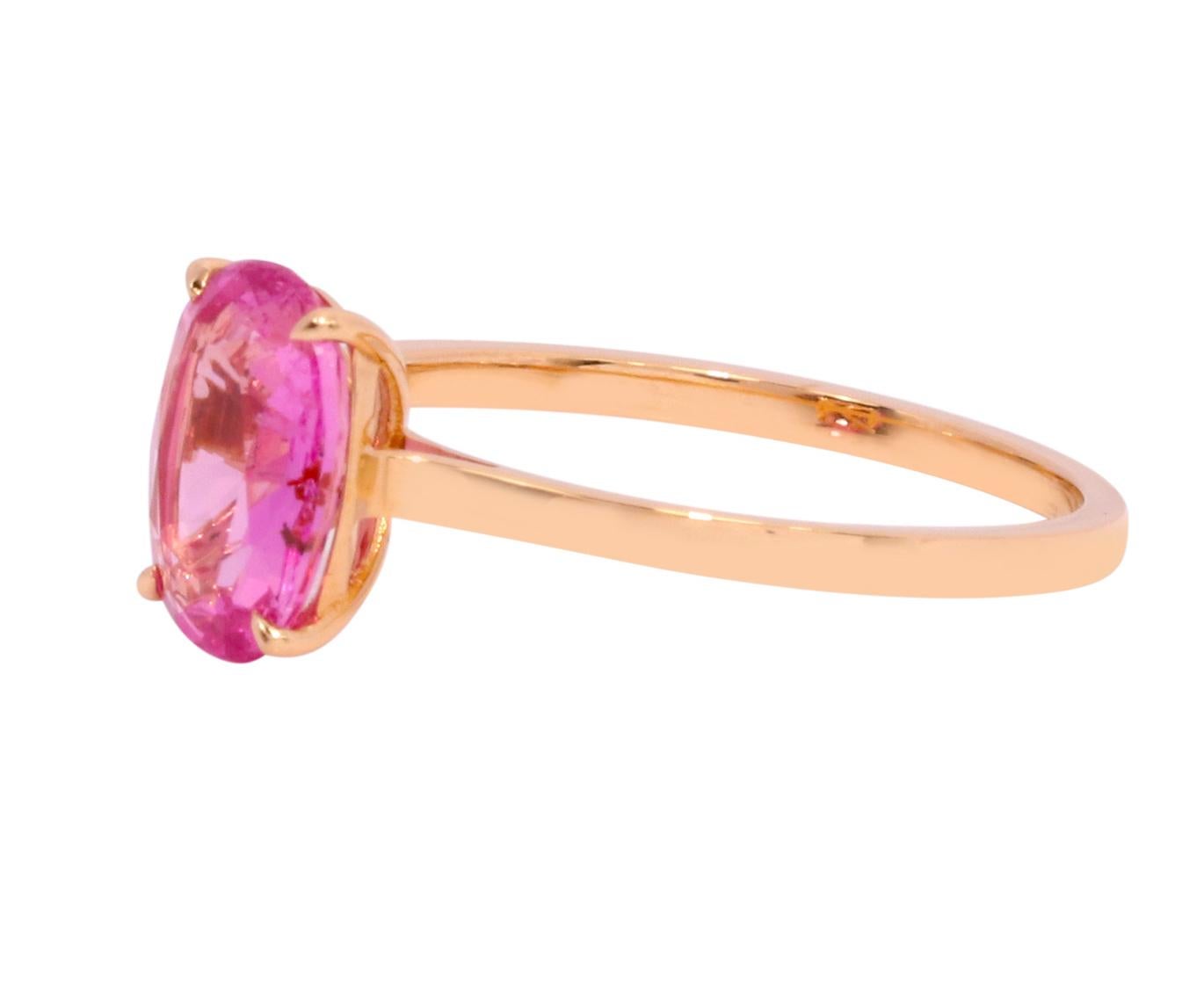 18 Karat Rose Gold 1.96 Carats Pink Sapphire Oval-Cut Ring in Prong Setting

Defining modern elegance at its best, this striking Oval-Cut Solitaire Pink-Sapphire is exquisite. Cradled in a four-prong setting, this contemporary classic is bound to