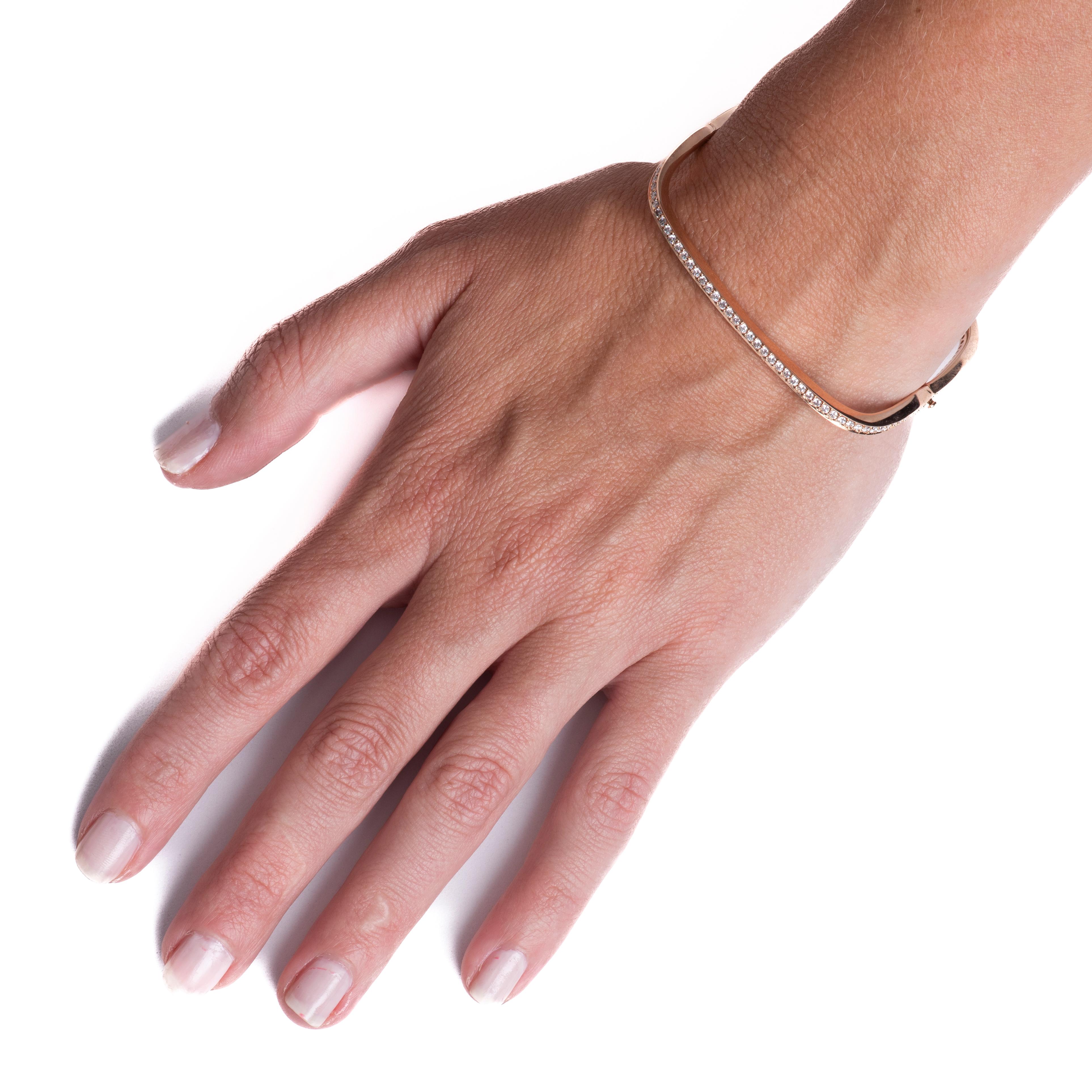This square shaped bangle features 2.10 carat total weight in round brilliant cut natural diamonds set in 18 karat rose gold. Wear alone or layer with your other favorite bracelets for a unique look. 
Measurements: Outer circumference approximately
