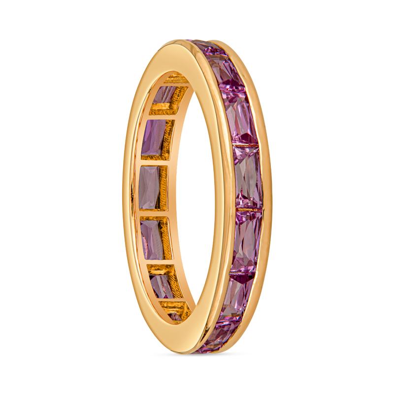 This 18 karat rose gold eternity band features 2.37 carat total weight in channel-set natural pink sapphire baguettes. Wear this band alone or layer with other rings for a unique look! It is a size 6. 
Measurements: Width approximately 3.40mm
